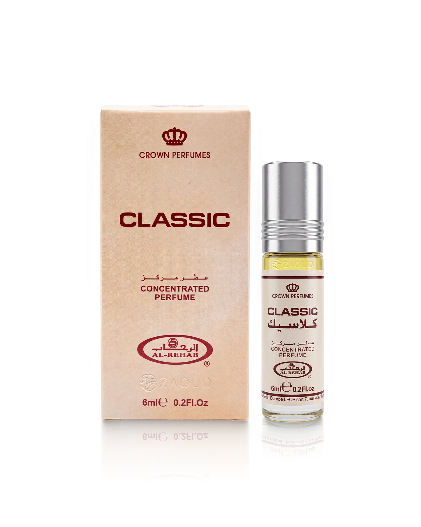 al rehab classic perfume oil 6ml rollerball bottle next to its beige cardboard packaging box, both featuring red and black text and a crown logo, on a white background with a soft reflection.