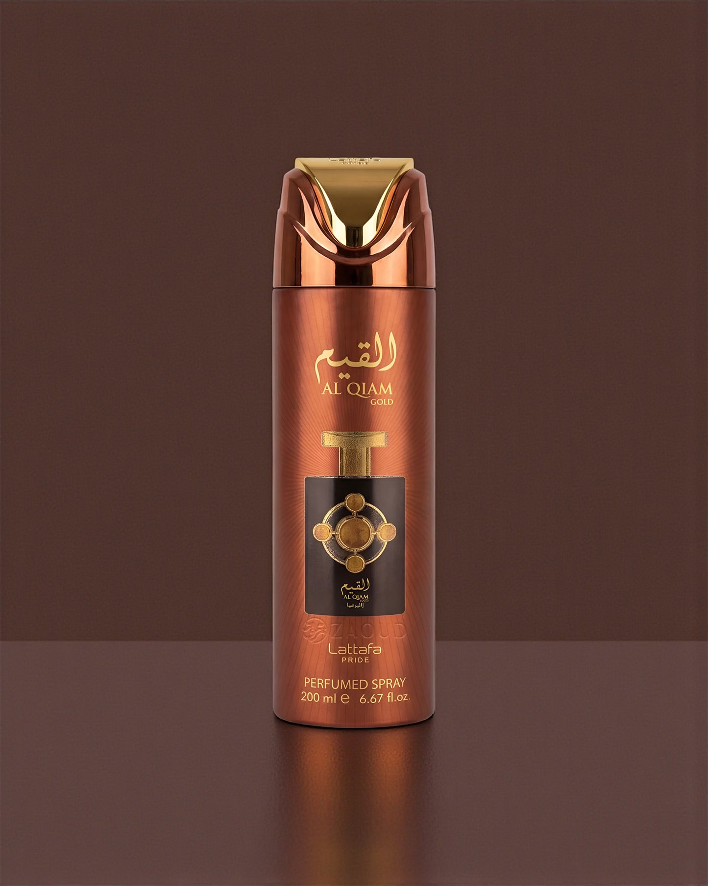 lattafa al qiam gold deodorant bottle with gold and brown design on a matching background