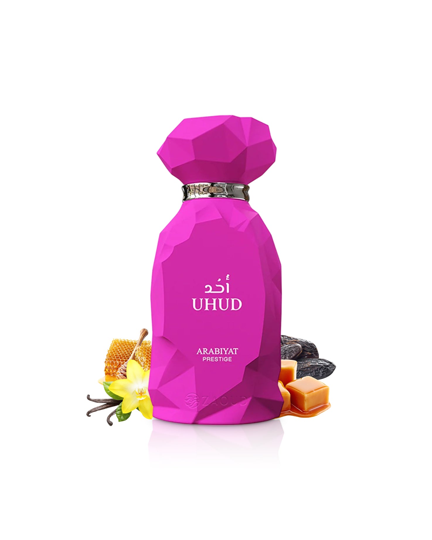 arabiyat prestige uhud perfume bottle surrounded by fragrance notes like caramel and vanilla shows against white background