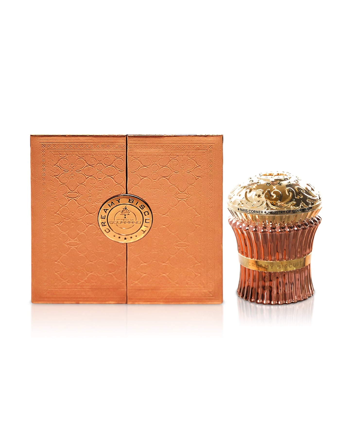 Paris corner creamy biscuit perfume bottle shows beside its box against white background