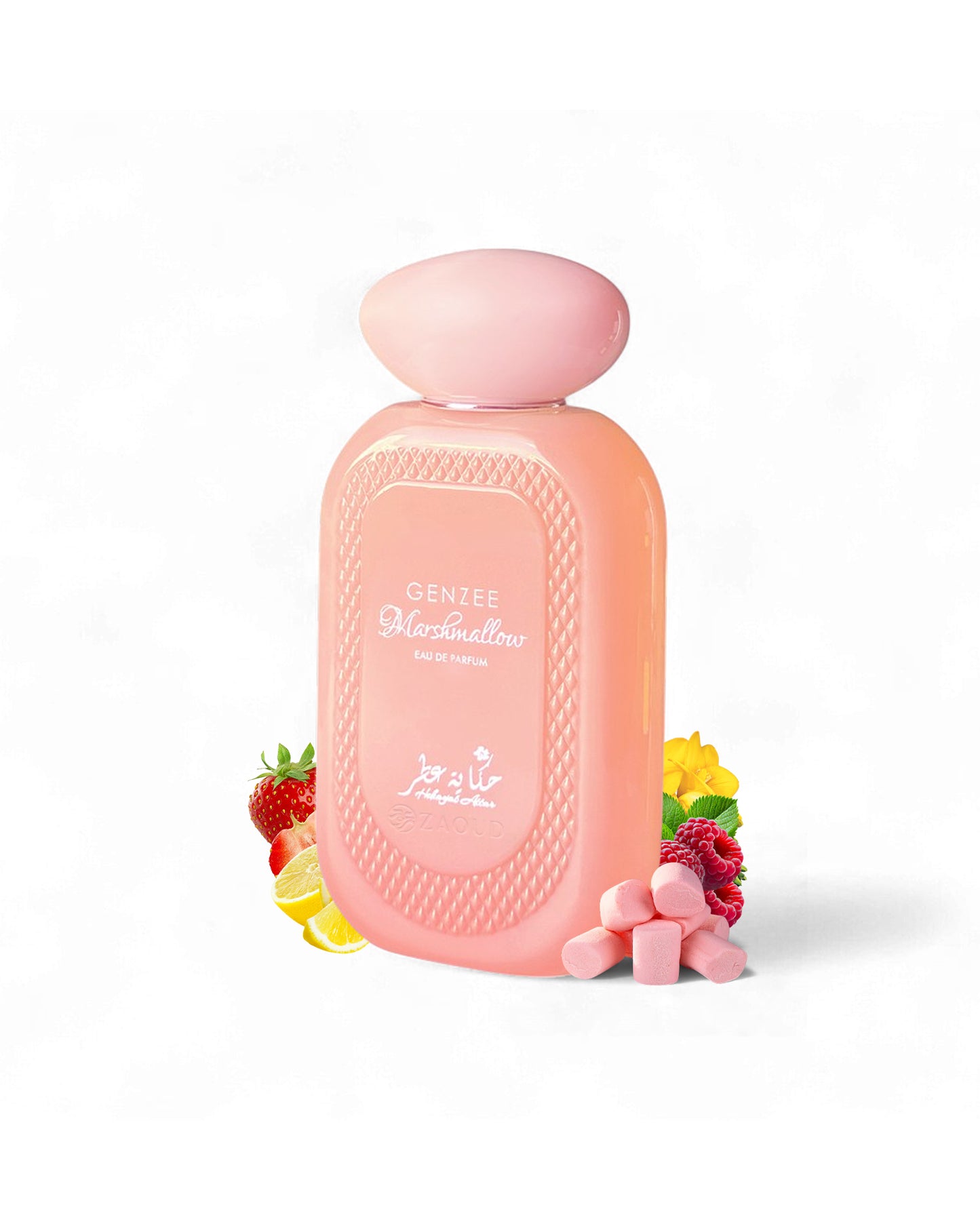 hekayat attar genzee marshmallow perfume bottle surrounded by marshmallow and strawberry shows against white background