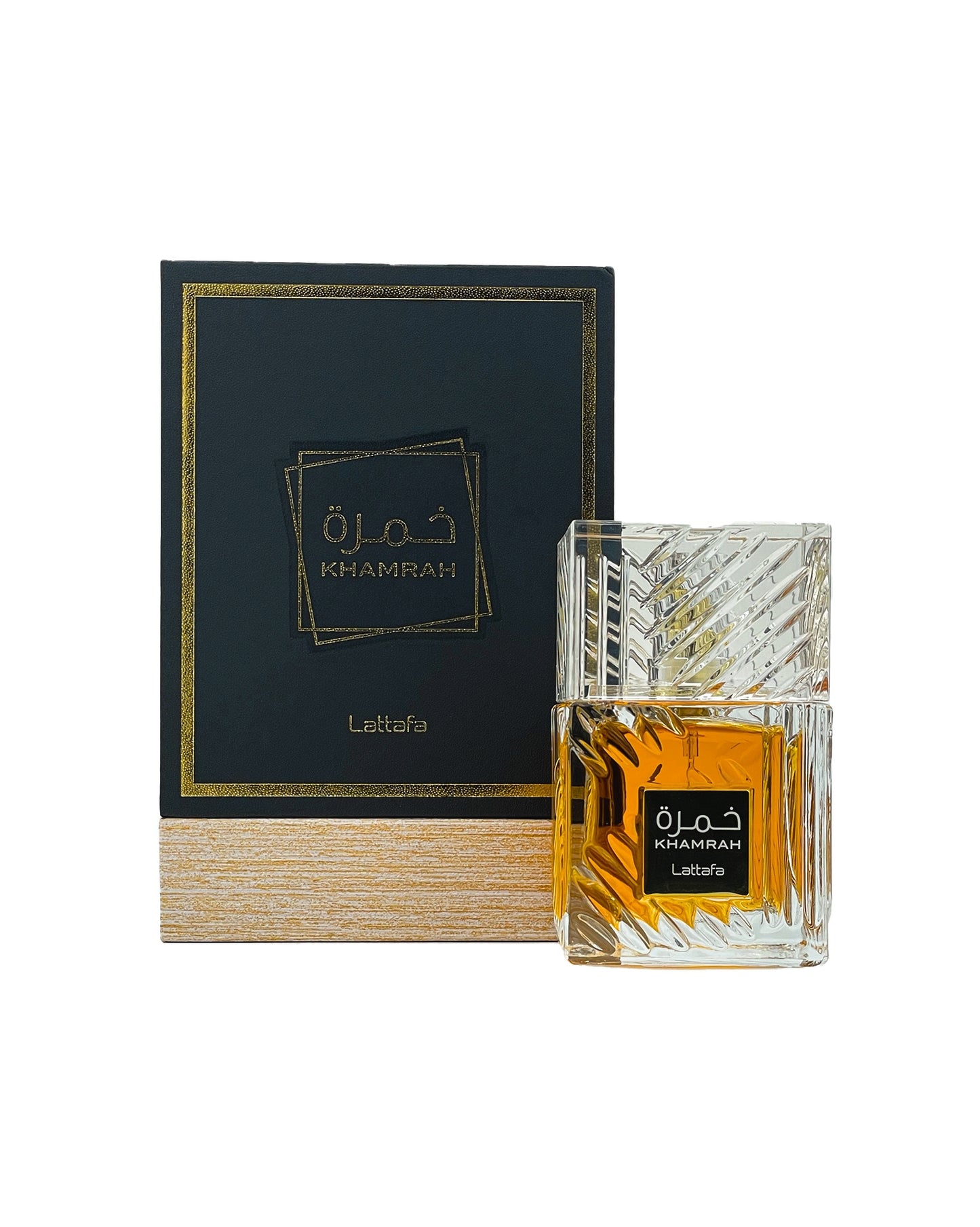 KHAMRAH EAU DE PARFUM perfume bottle beside its box against white background