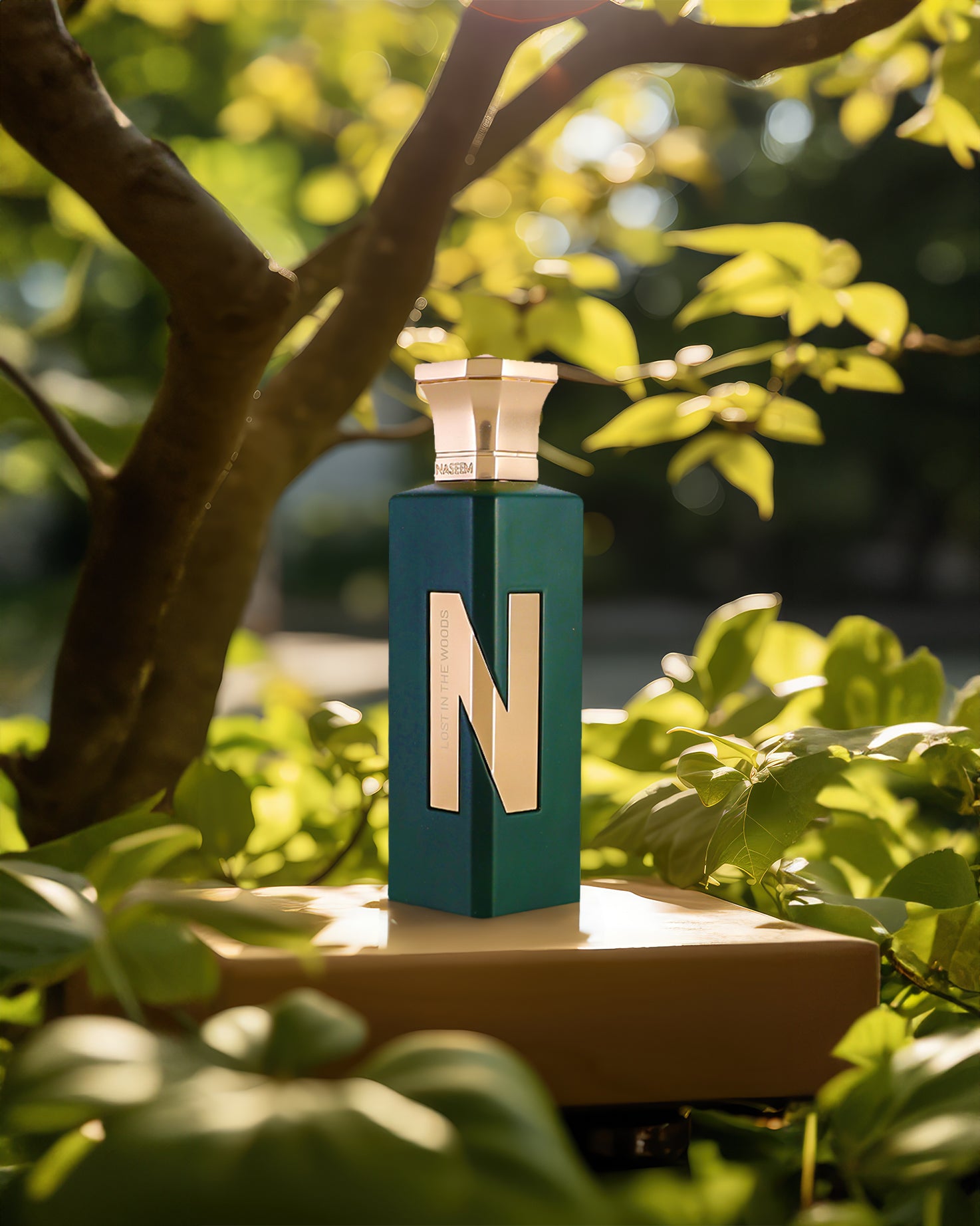 LOST IN THE WOODS aqua parfum bottle under green tree