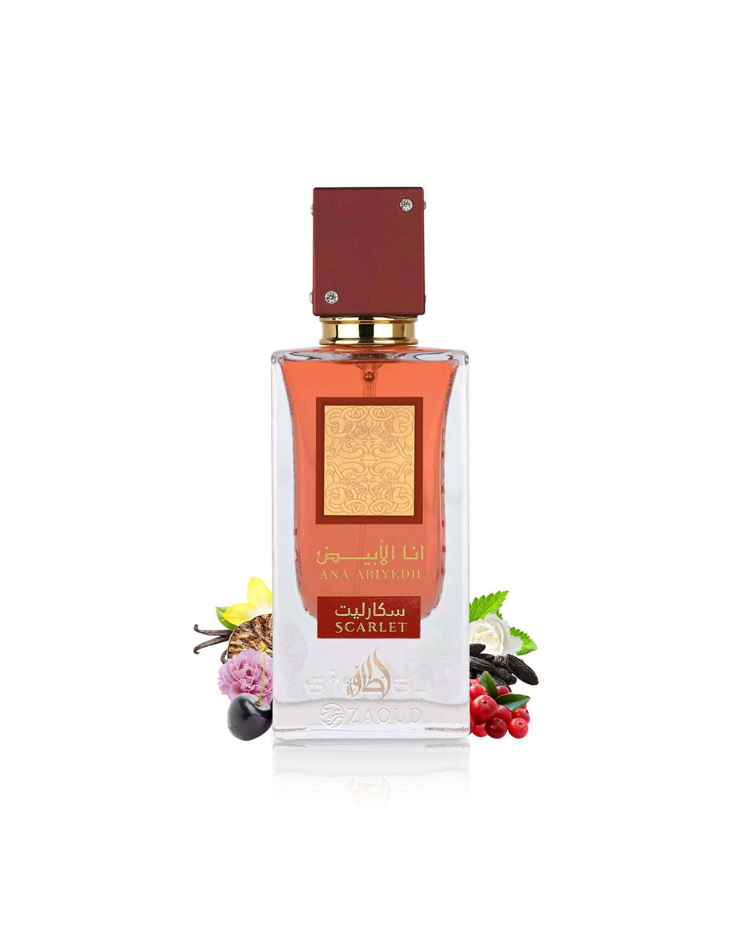 lattafa ana abiyedh scarletPerfume bottle surrounded by berries and vanilla with a red cap and gold label on a white background