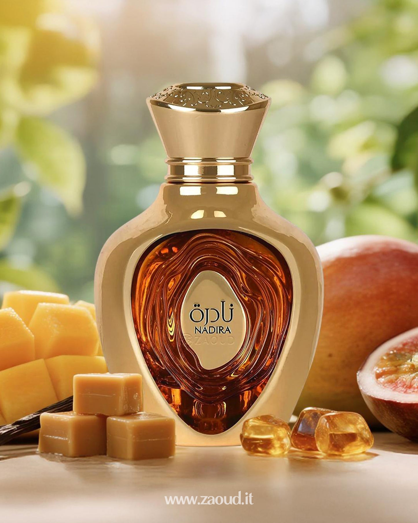 Lattafa Nadira perfume bottle, placed among fresh mango cubes, passionfruit, caramel pieces, vanilla, and amber stones, set against a natural blurred background.