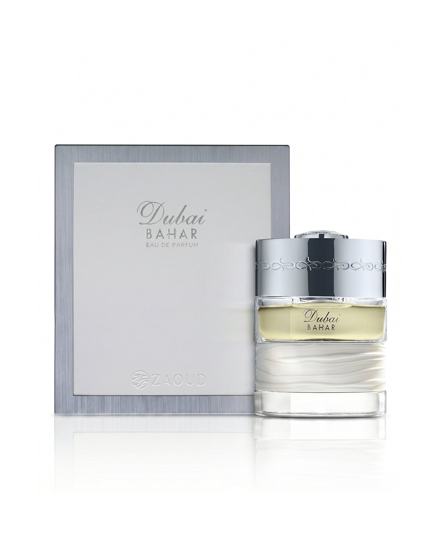 spirit of dubai bahar perfume bottle shows beside its packaging against white background