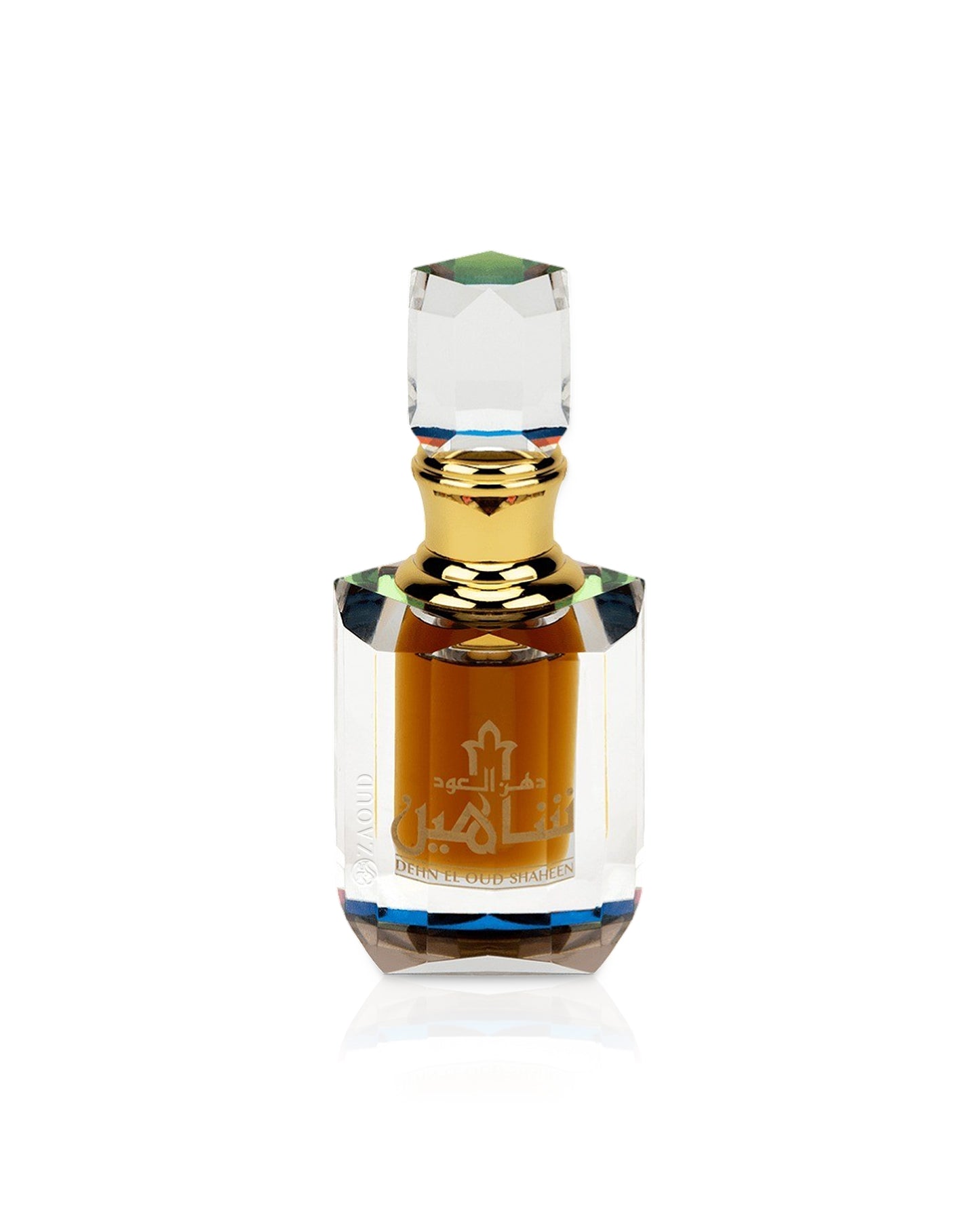 Dehn el oud shaheen Perfume oil bottle with gold cap and clear glass body on a white background