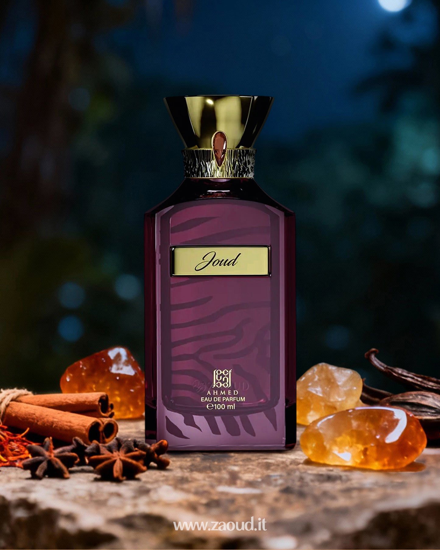 Perfume bottle with gold cap and purple label on a wooden surface with amber and cinnamon sticks.