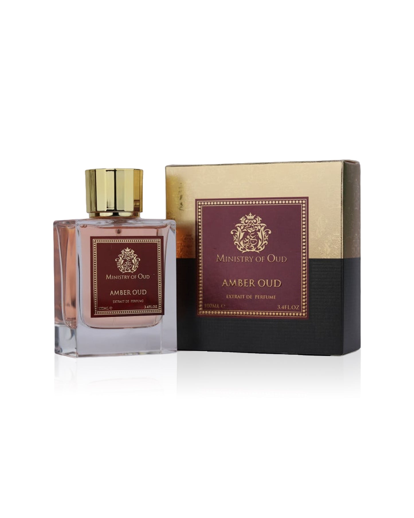 amber oud by ministry of oud perfume bottle shows beside its box against white background