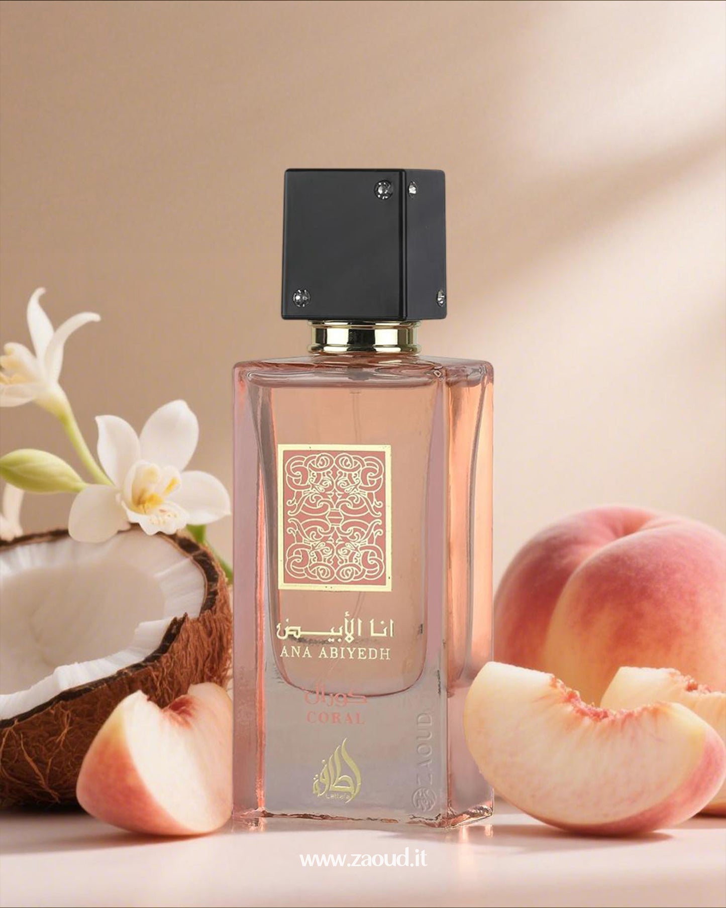 Ana Abiyedh Coral perfume bottle with peach, coconut, and floral accents, showcasing the elegant design and fragrance notes arround against pink background