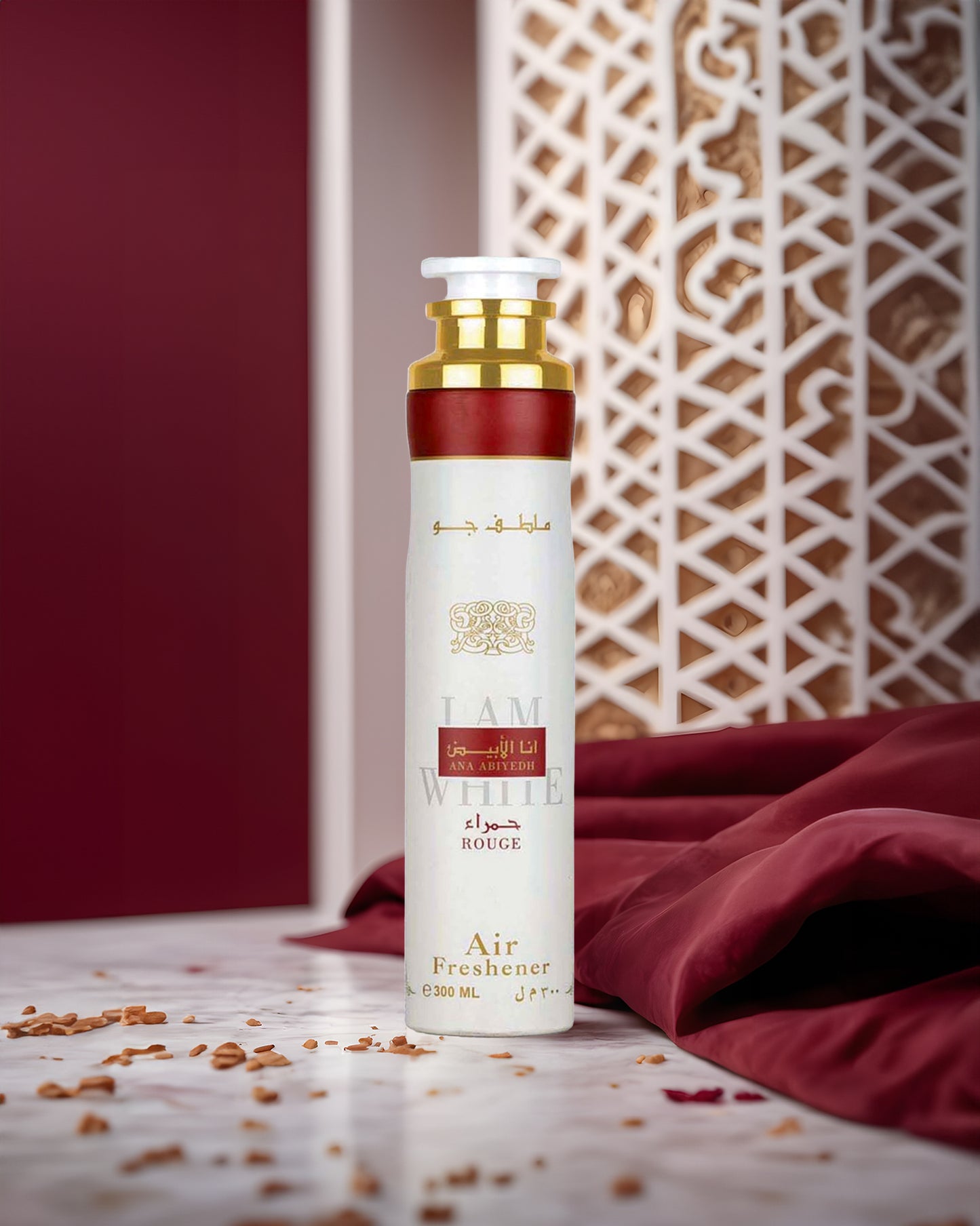 ana abiyedh rouge air freshner bottle photograph inside room besides red febric