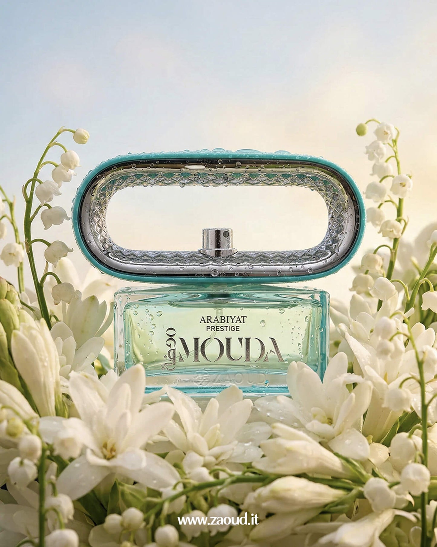 Arabiyat Prestige Mouda perfume bottle surrounded by white jasmine and lily of the valley flowers representing a floral sandalwood fragrance.
