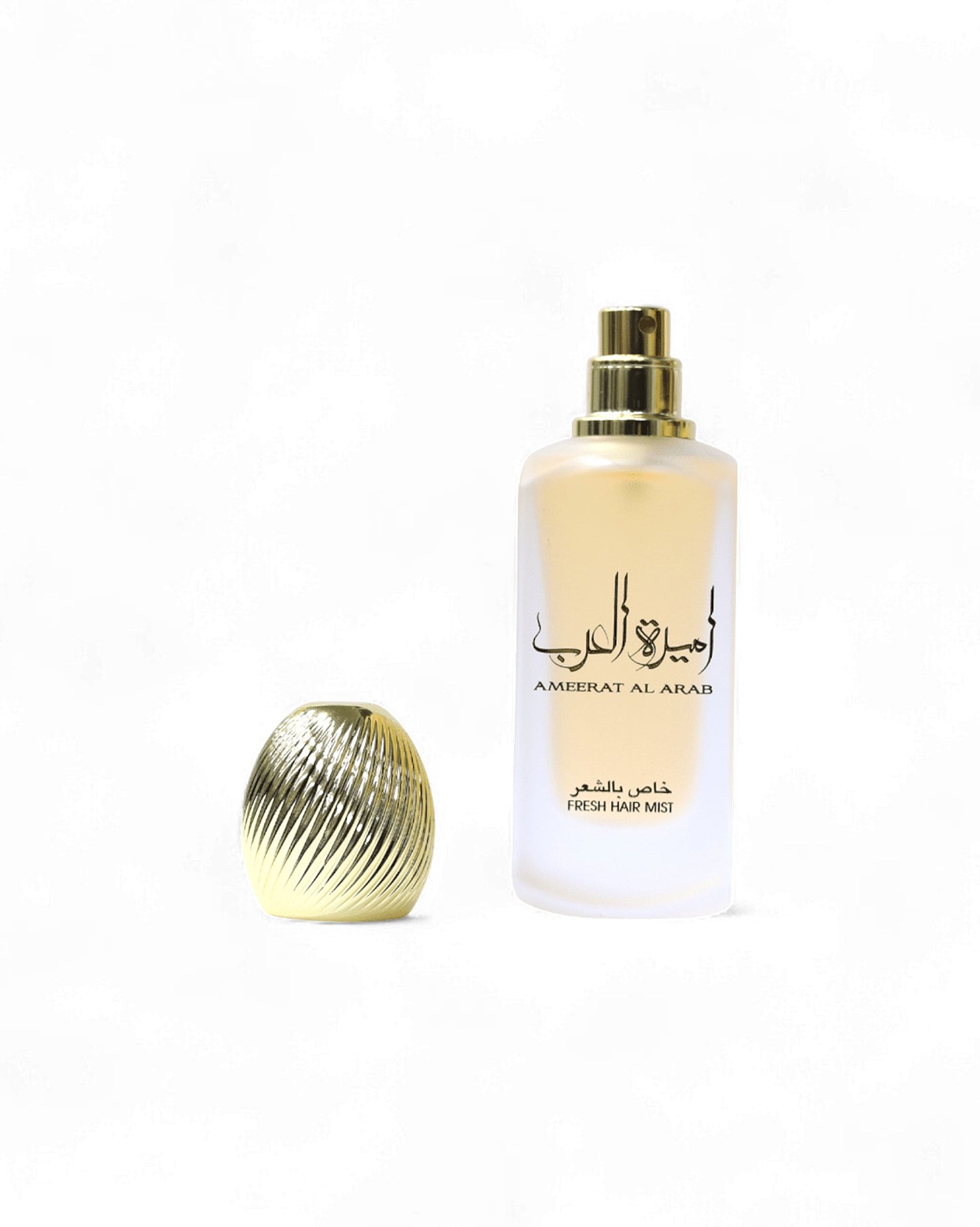 asdaaf ameerat al arab hair mist bottle shows beside its cap opened against white background