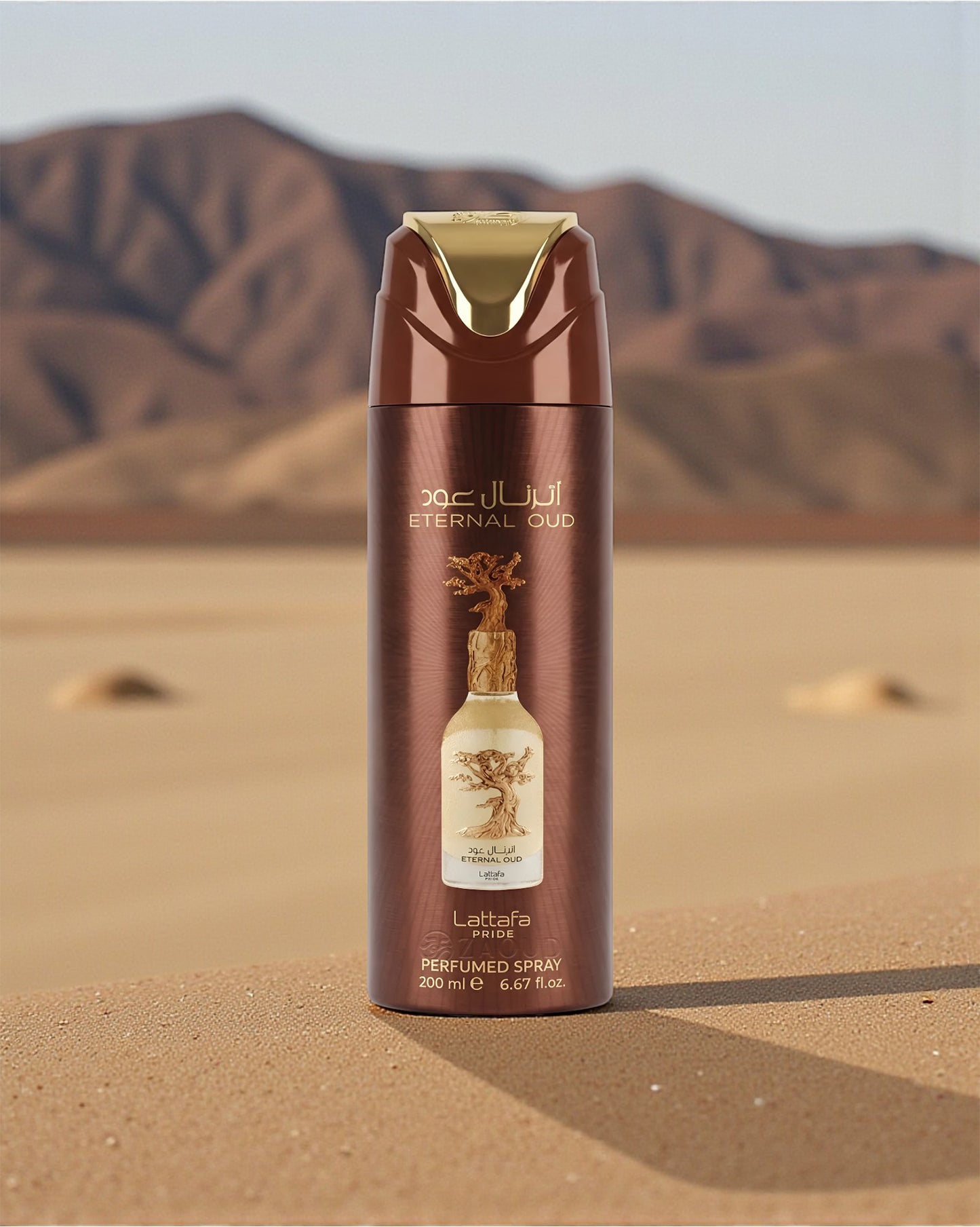lattafa eternal oud deodorant bottle with desert and mountains in the background