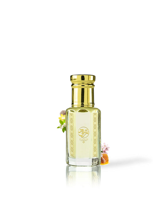 ferona perfume oil bottle surrounded with fragrance notes like honey and vanilla against white background