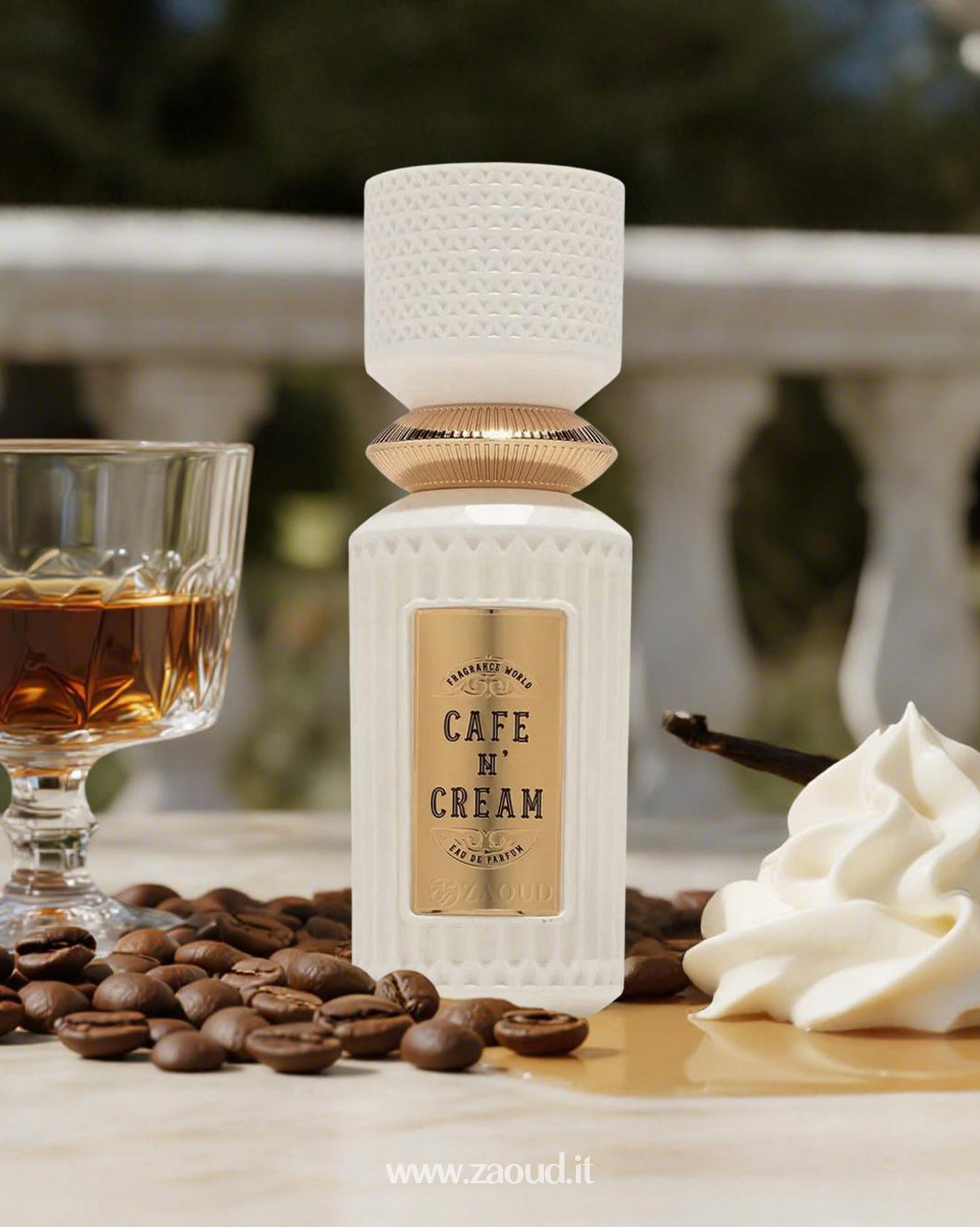 White bottle labeled 'Cafe N' Cream' with a glass of liquid, coffee beans, and whipped cream on a blurred background.