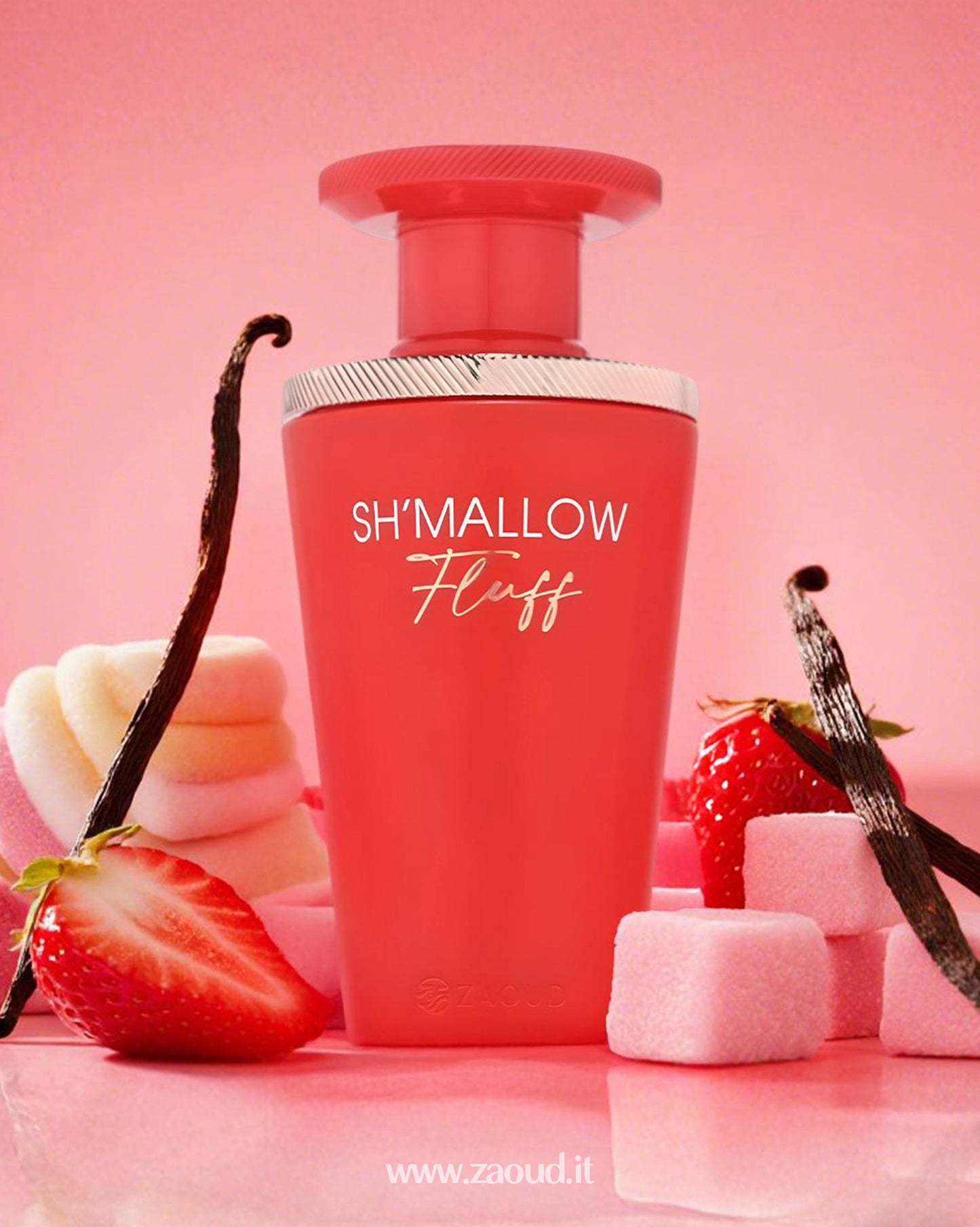 Pink bottle labeled 'SH'MALLOW Fluff' with vanilla beans, strawberries, and marshmallows on a pink background.