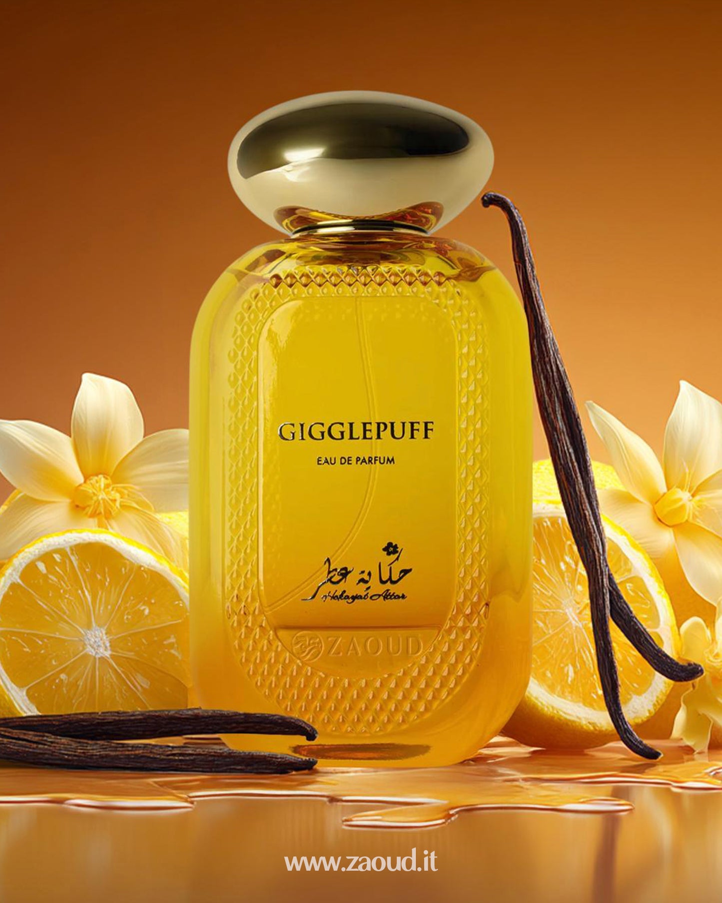 A perfume bottle of Gigglepuff by Hekayat Attar, surrounded by lemon slices, vanilla flowers, and vanilla beans, on a warm orange background with honey-like drops.