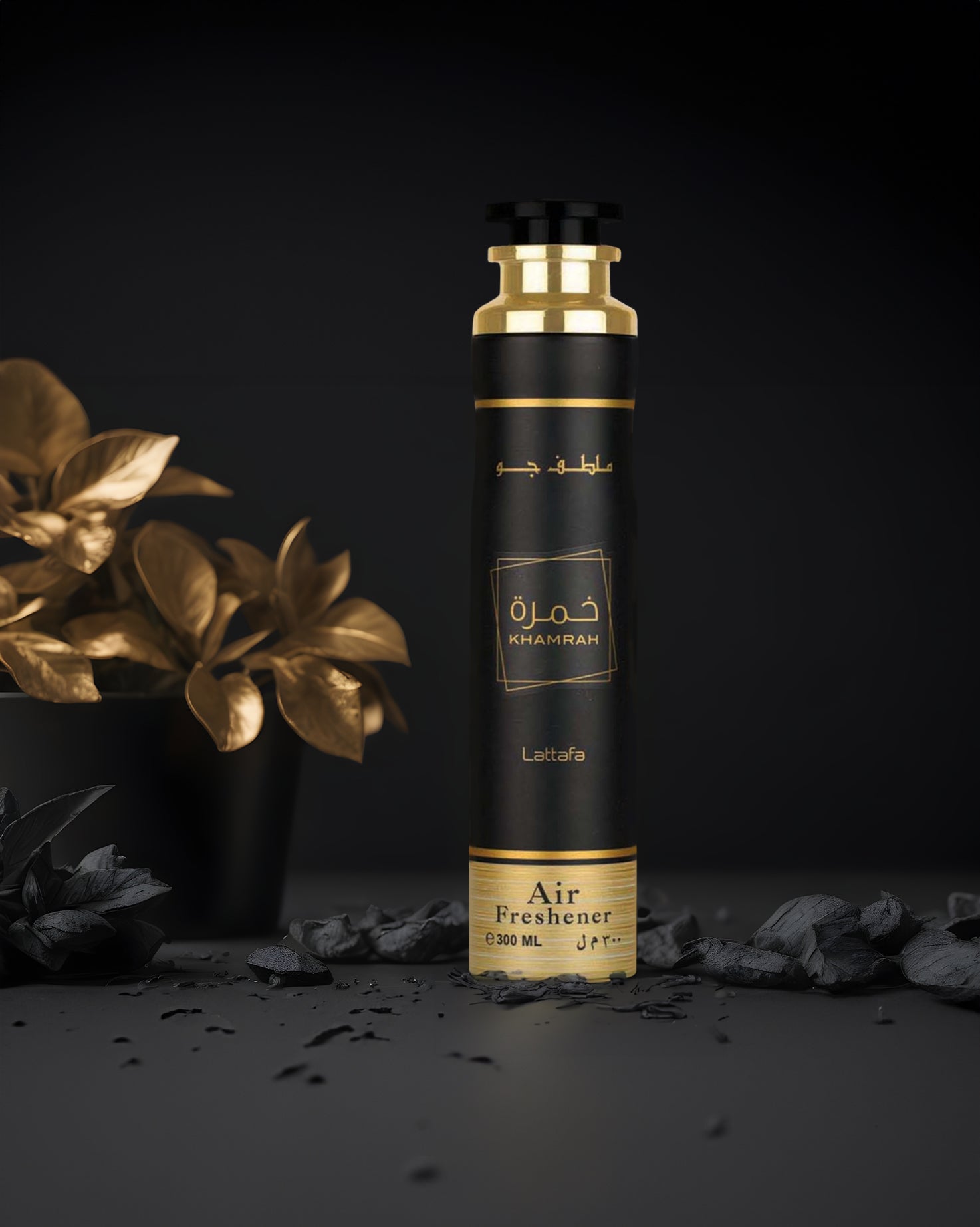 khamrah air freshener bottle photograph with golden leafs at background