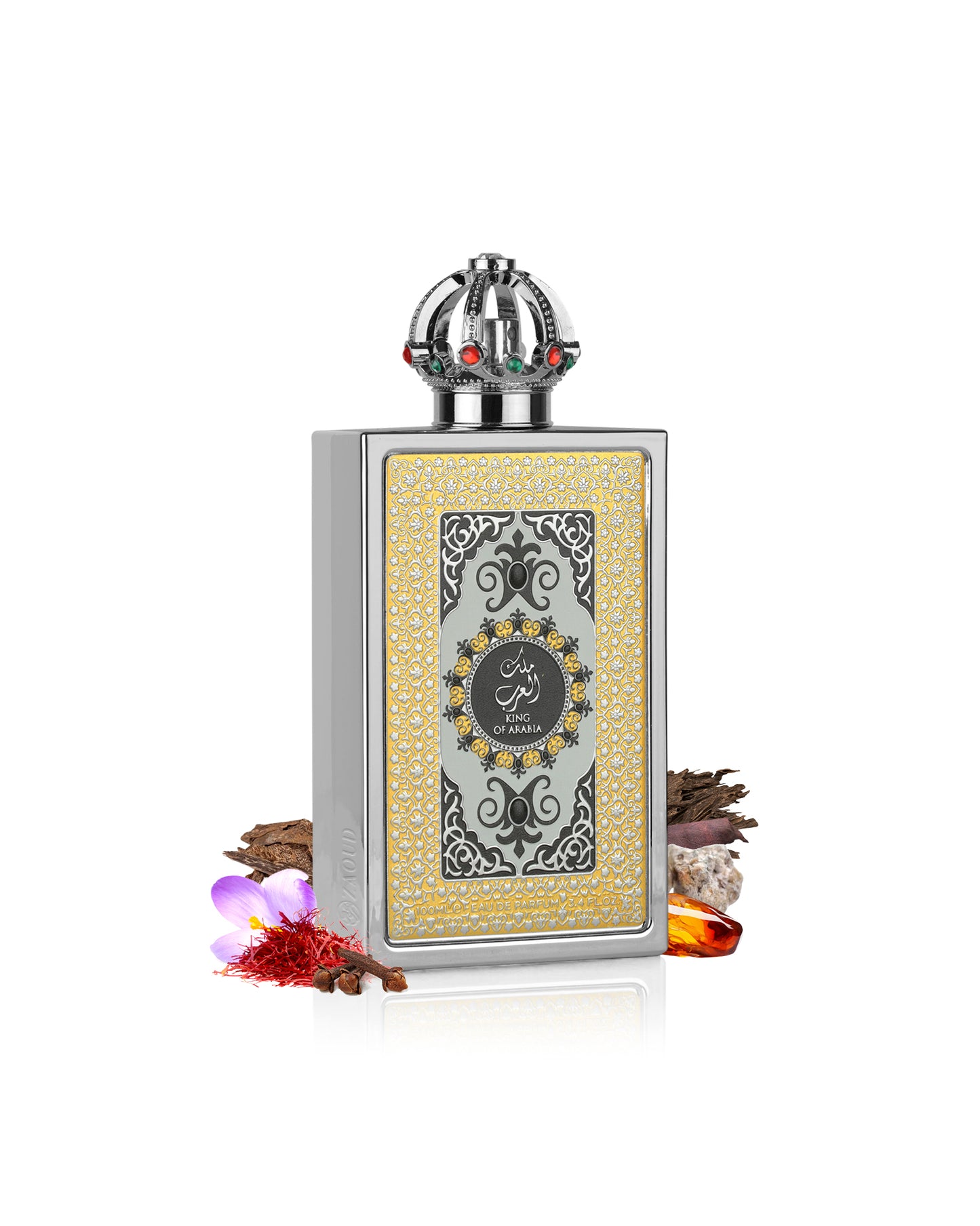 lattafa king of arabia Decorative bottle with intricate design bottle surrounded by cloves and saffron on a white background