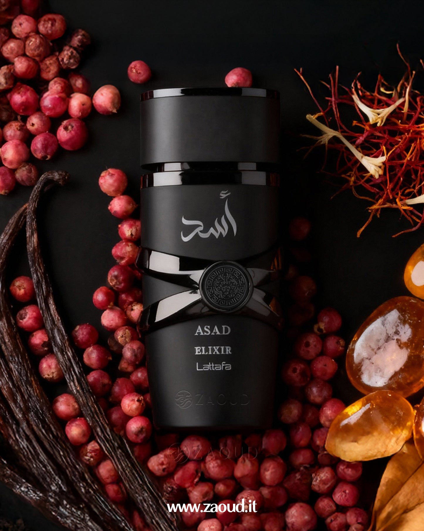 Black bottle of Asad Elixir Lattafa surrounded by red berries and vanilla beans on a dark background