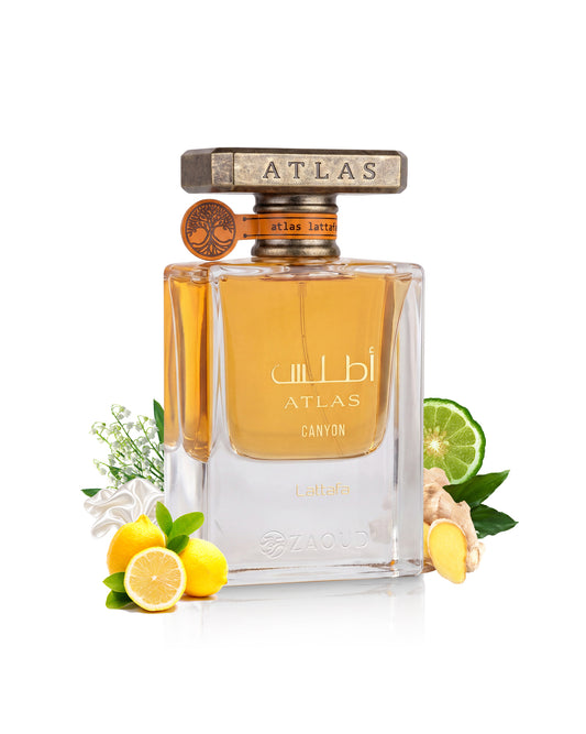 lattafa atlas canyon perfume bottle surrounded with fragrance notes like lemon and ginger shows against white background