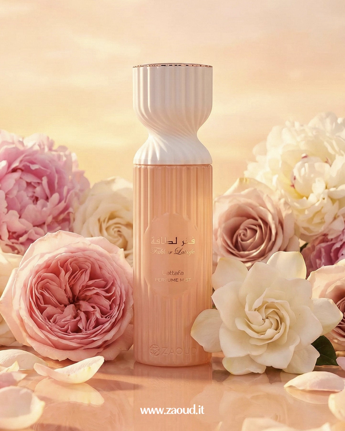 lattafa-fakhar-rose-body-mist bottle surrounded by pink and white flowers on a soft background