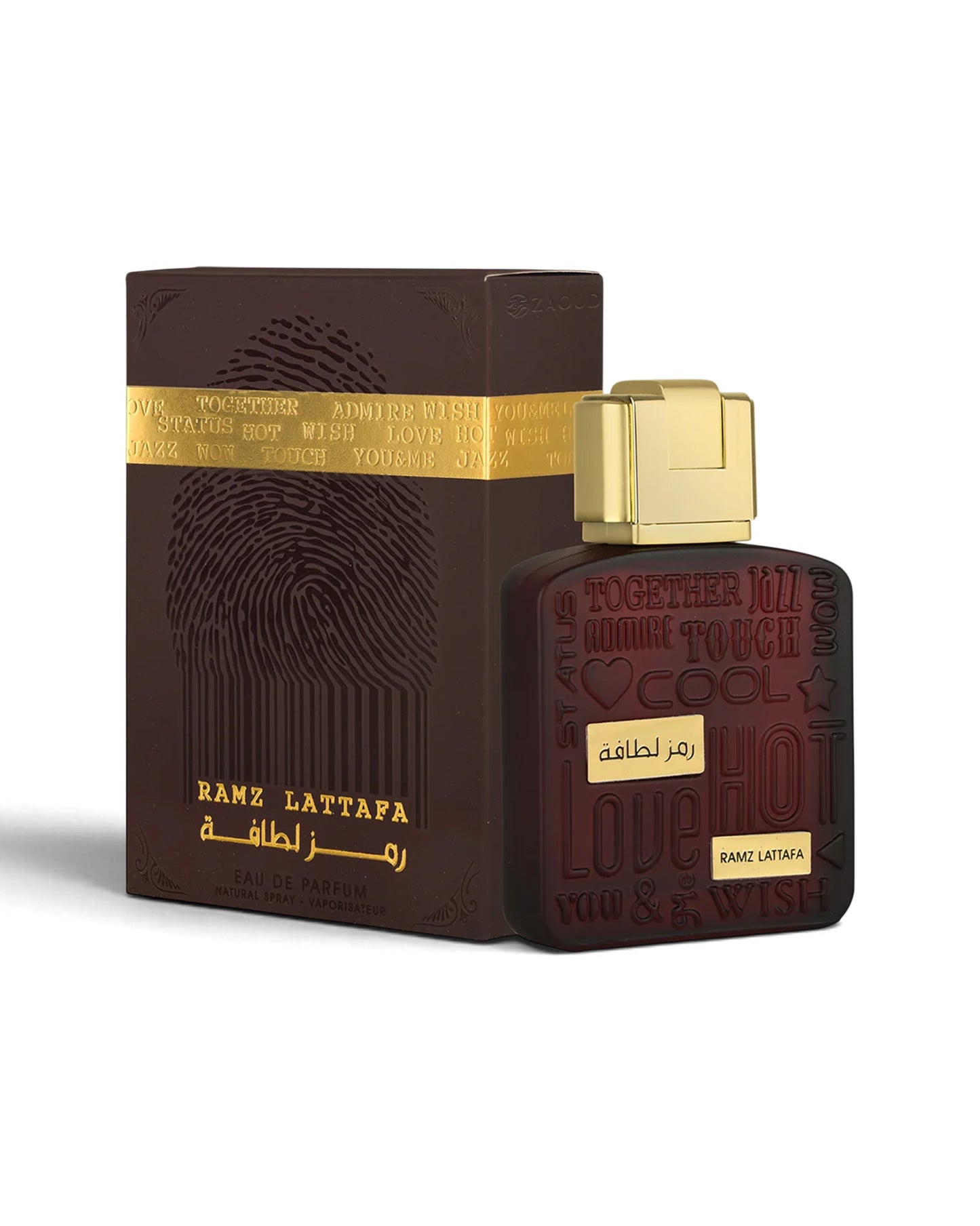 lattafa ramz gold perfume bottle shows beside its packaging against white background