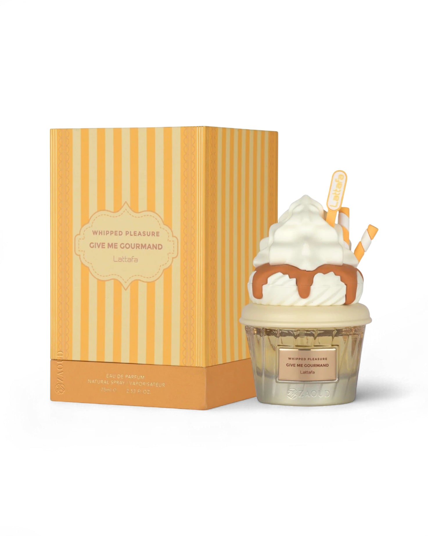 lattafa whipped pleasure give me gourmand perfume botttle shows beside its packaging against white background