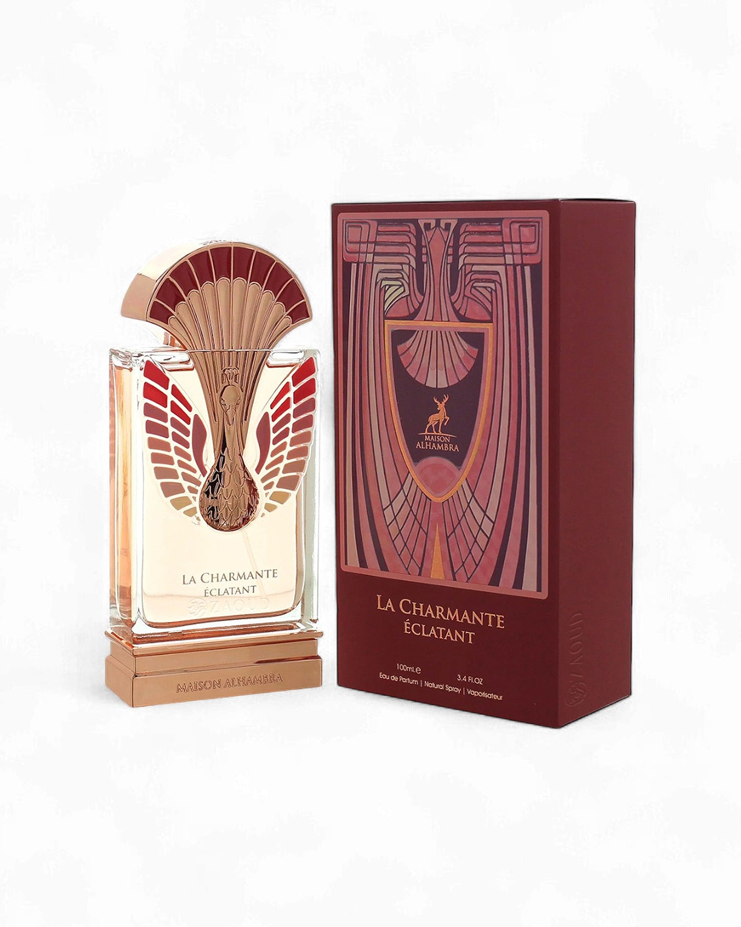 Maison Alhambra La Charmante Eclatant perfume bottle shows beside its box against white background