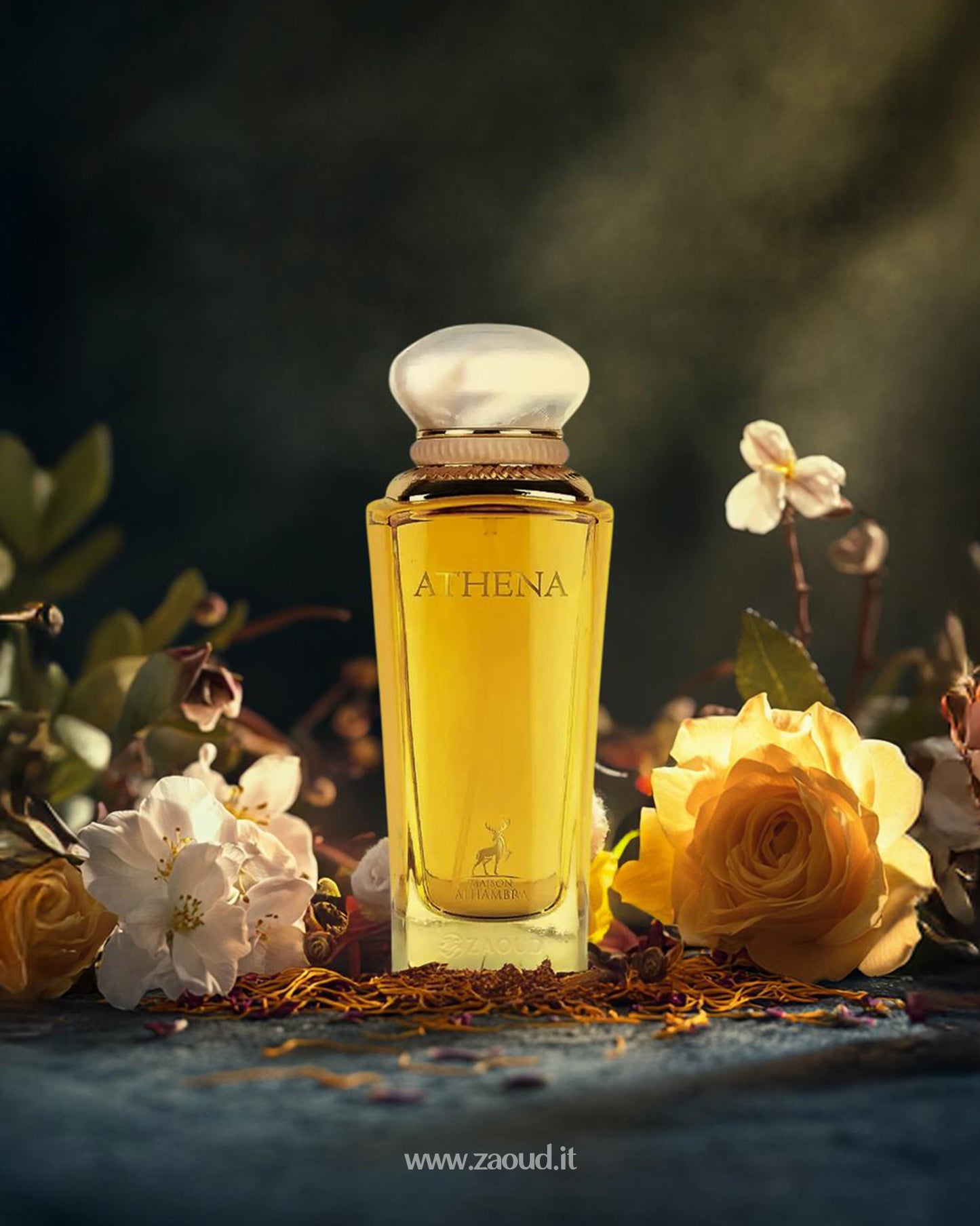 maison alhambra athena perfume bottle photograph besides yellow flowers and saffron with sun light from background