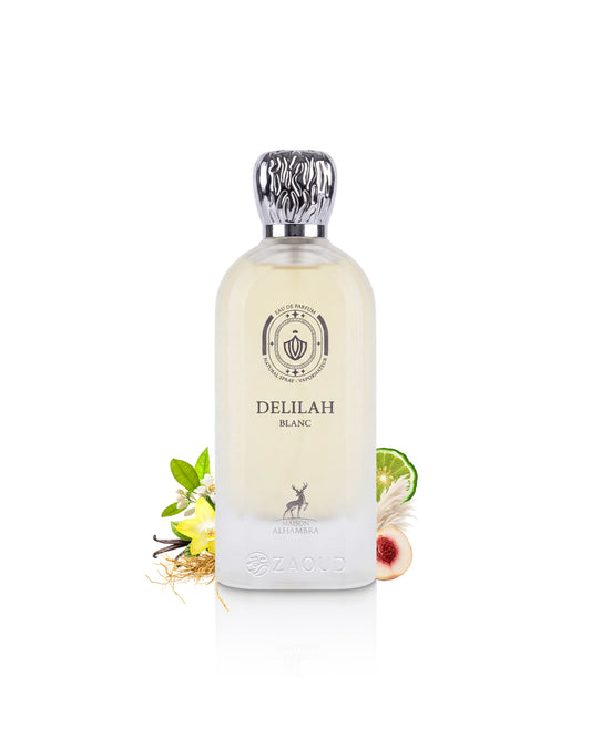 maison alhambra Delilah Blanc perfume bottle surrounded with fragrance notes like peach and vanilla shows against white background