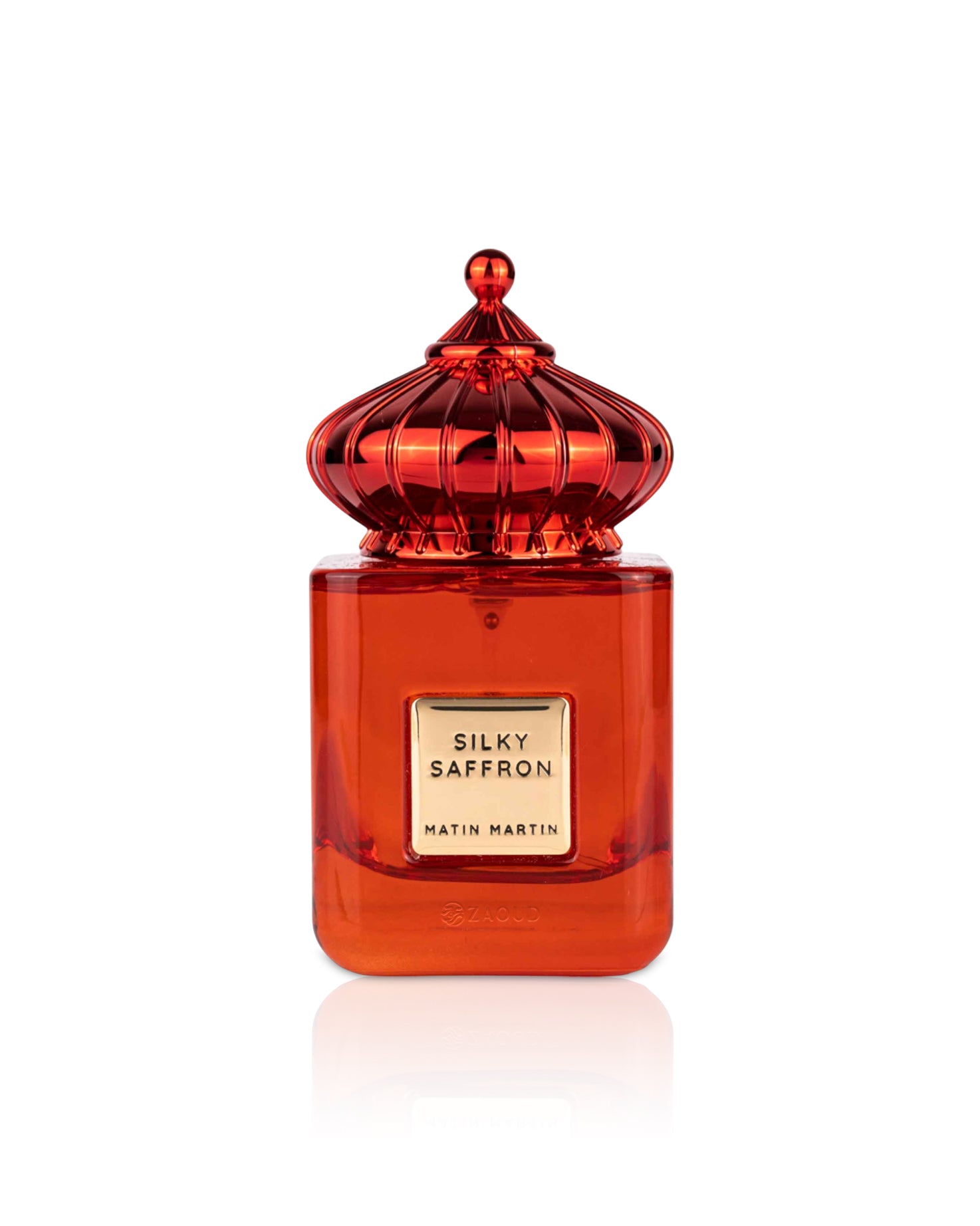 Red perfume bottle labeled 'Silky Saffron' by Matin Martin on a white background