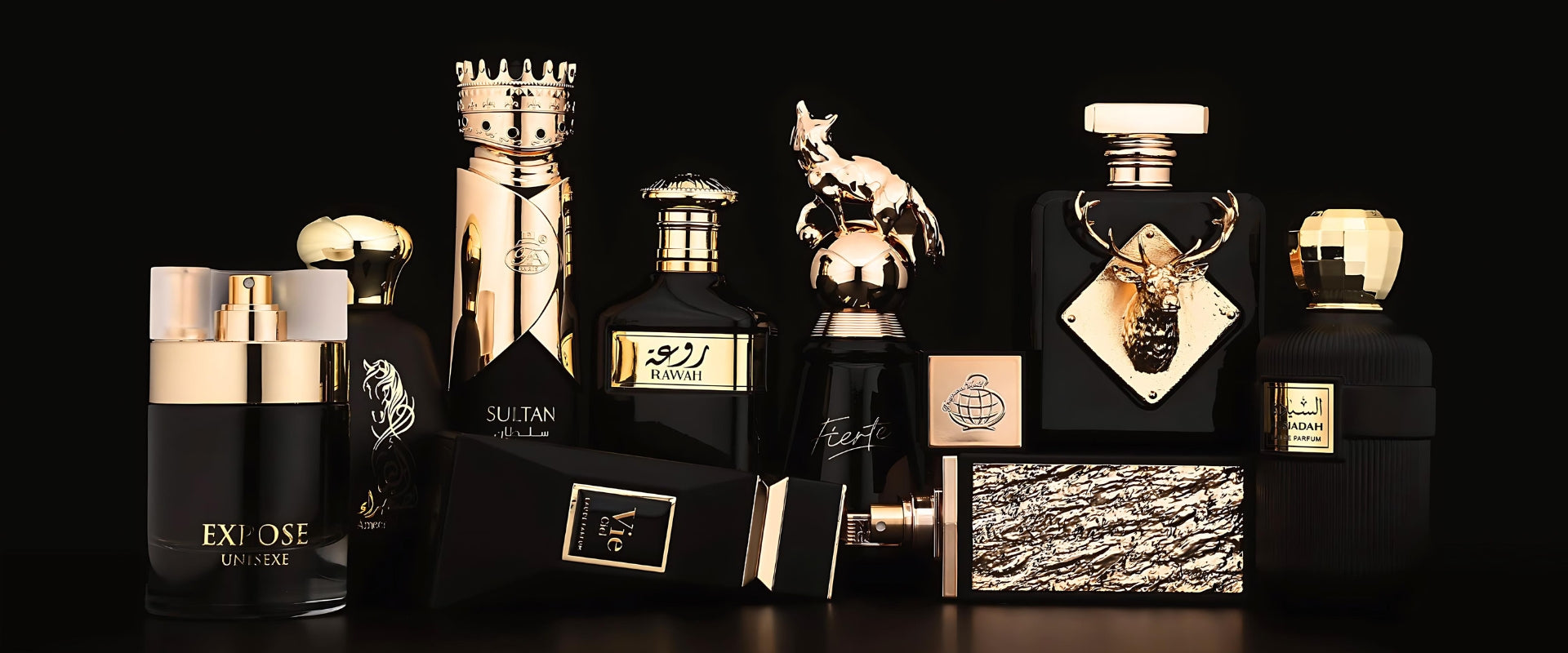 multiple perfumes photograph by fragrance world dubai against black background