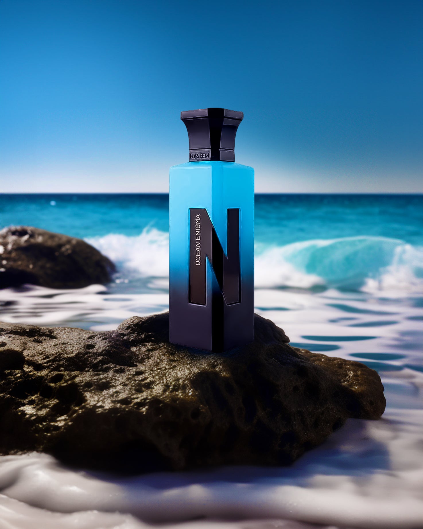 ocean enigma aqua parfum bottle infront of seashore over rock