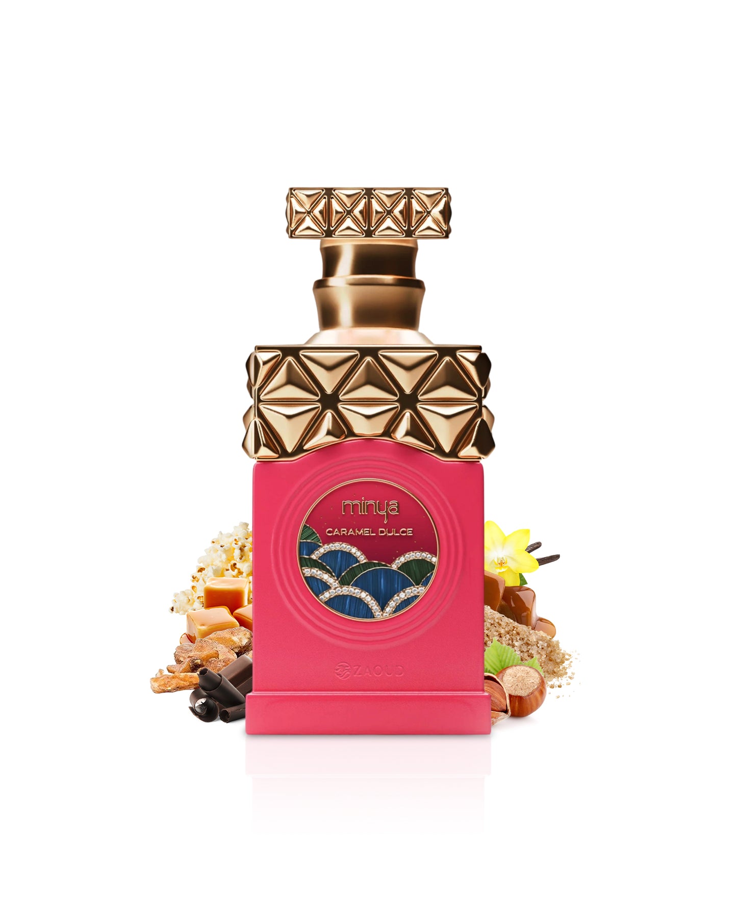 paris corner minya caramel dulce Pink perfume bottle surrounded by chocolate and caramel with gold cap on a white background