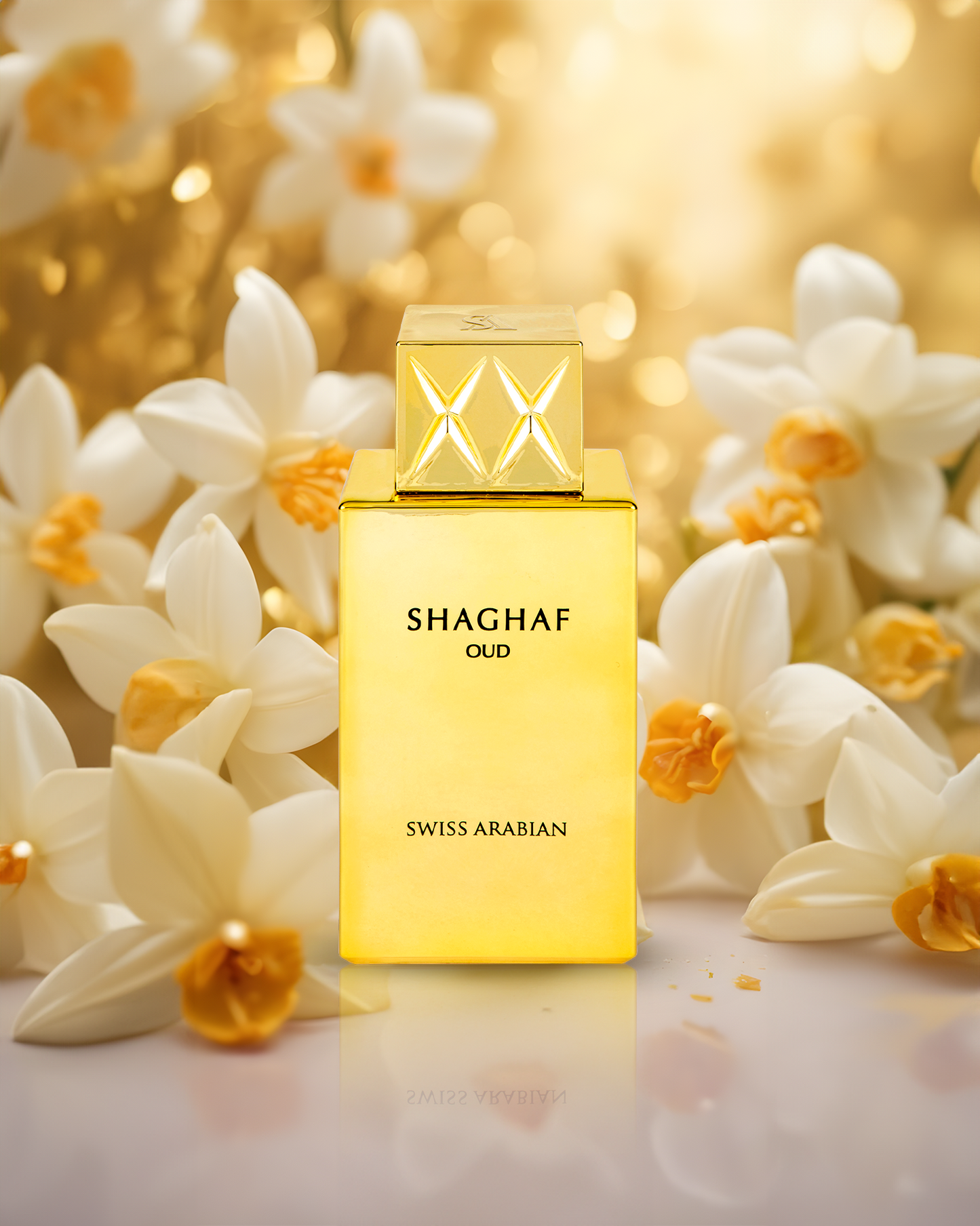 swiss arabian Shaghaf Oud perfume bottle surrounded by white flowers with a blurred gold background