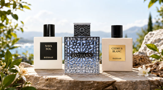 rayhaan aquatica perfume bottle beside cedrus blanc and nova sol bottles place over rock