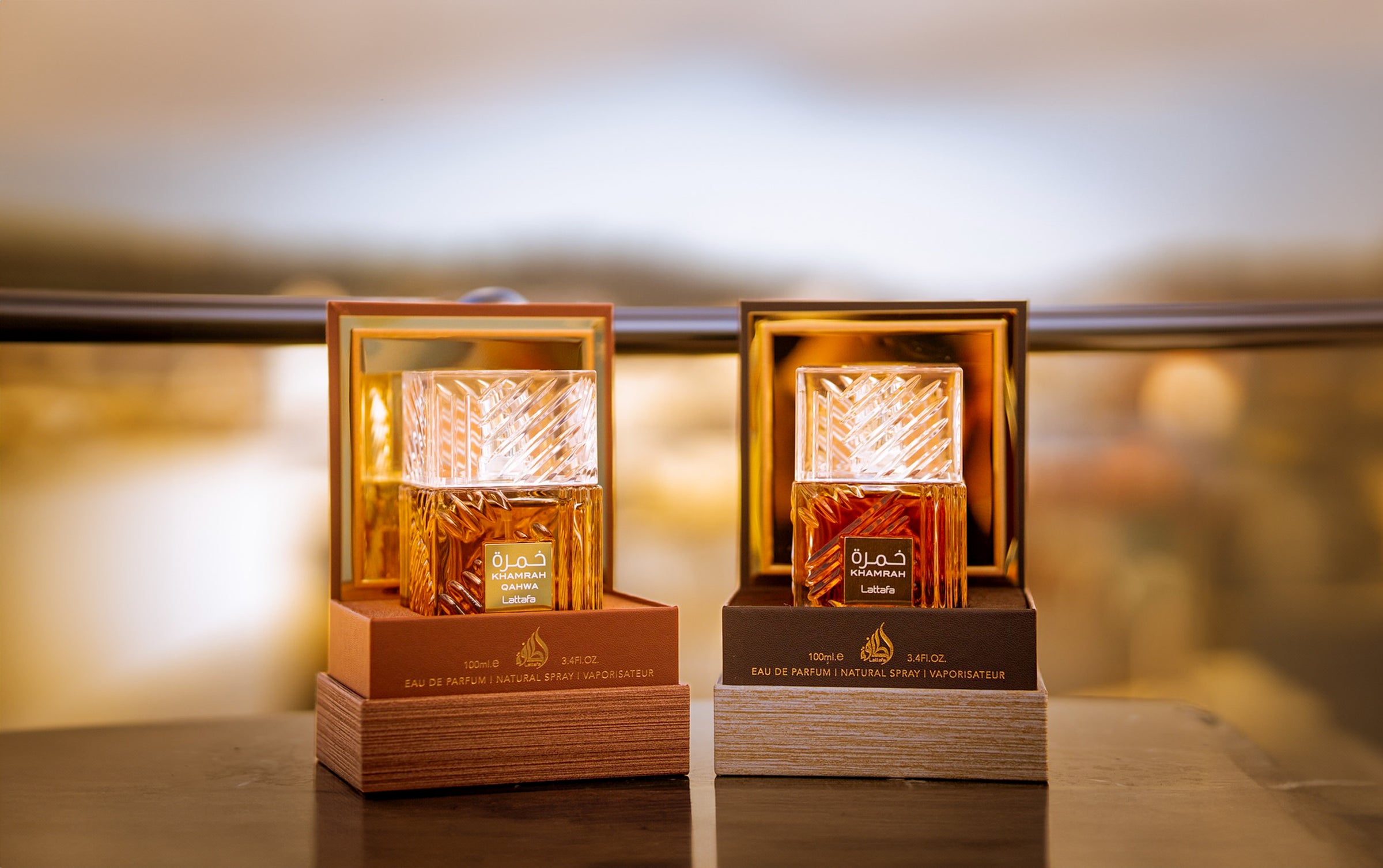 Lattafa perfume bottles of khamrah and khamrah qahwa.