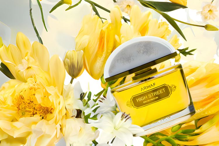 armaf high street perfume bottle photograph surrounded by yellow flowers.