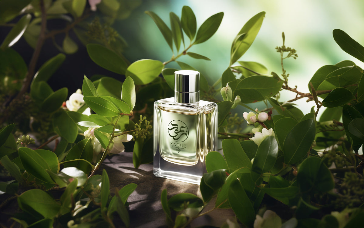 green perfume bottle surrounded by green leaves.