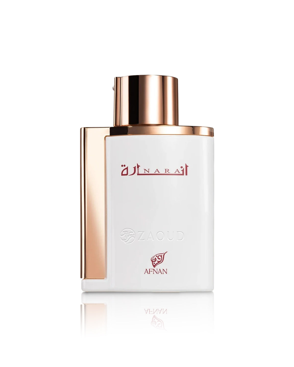 afnan inara white perfume bottle with a metallic rose gold cap and side panel, featuring red Arabic script and the brand name 'Zaoud' on the front, set against a clean white background with a soft reflection below.