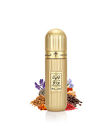 Ibrahim Al Qurashi Arabian Tobacco extrait de parfum bottle surrounded with fragrance notes like ambe and coffee shows from behind the bottle against white background