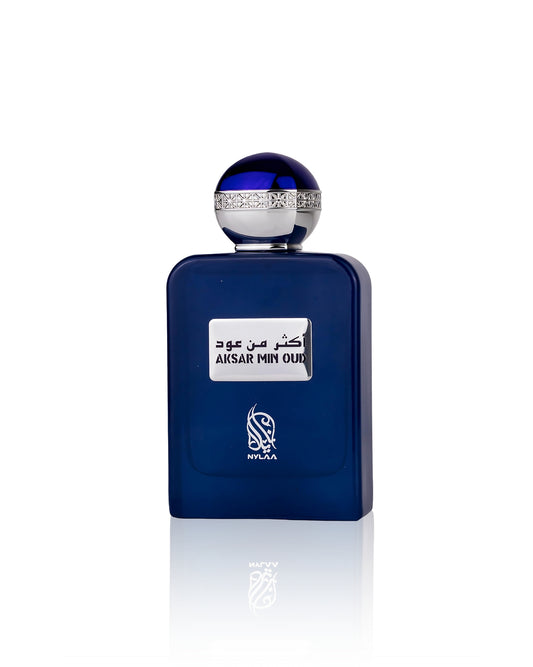 Aksar min oud perfume bottle against white background
