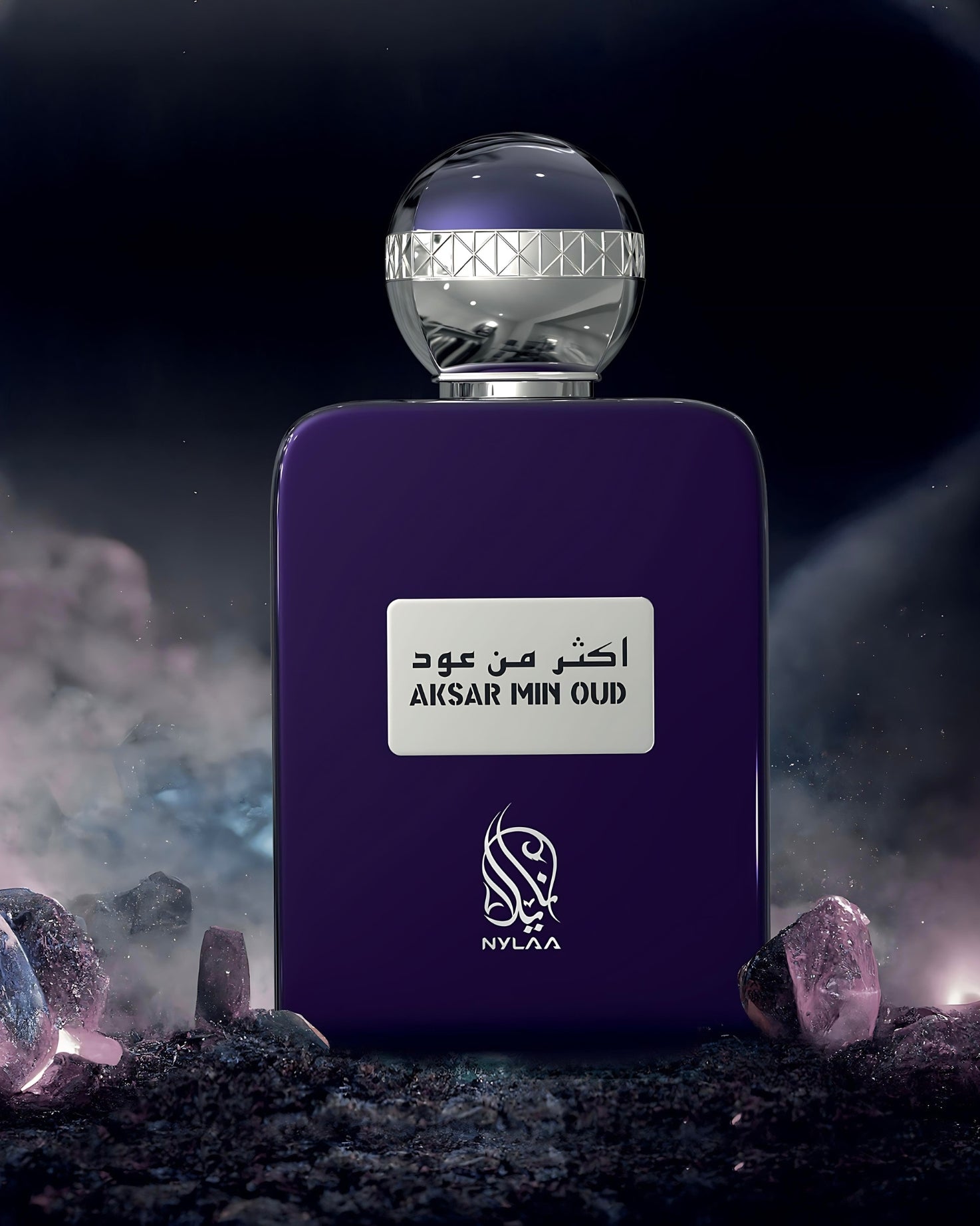 Aksar min oud perfume bottle photograph surrounded with gems with space background