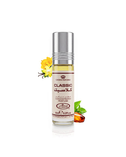 al rehab classic perfume oil bottle surrounded with fragrance notes like amber and vanilla shows against white background