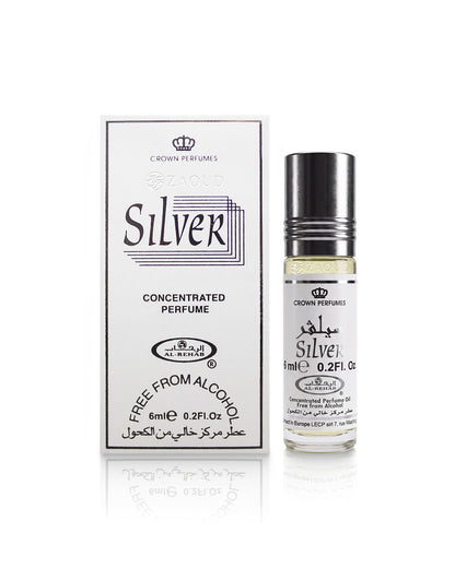 al rehab Silver concentrated perfume roll-on bottle with its white packaging box, featuring black text and a silver cap, on a white reflective background.