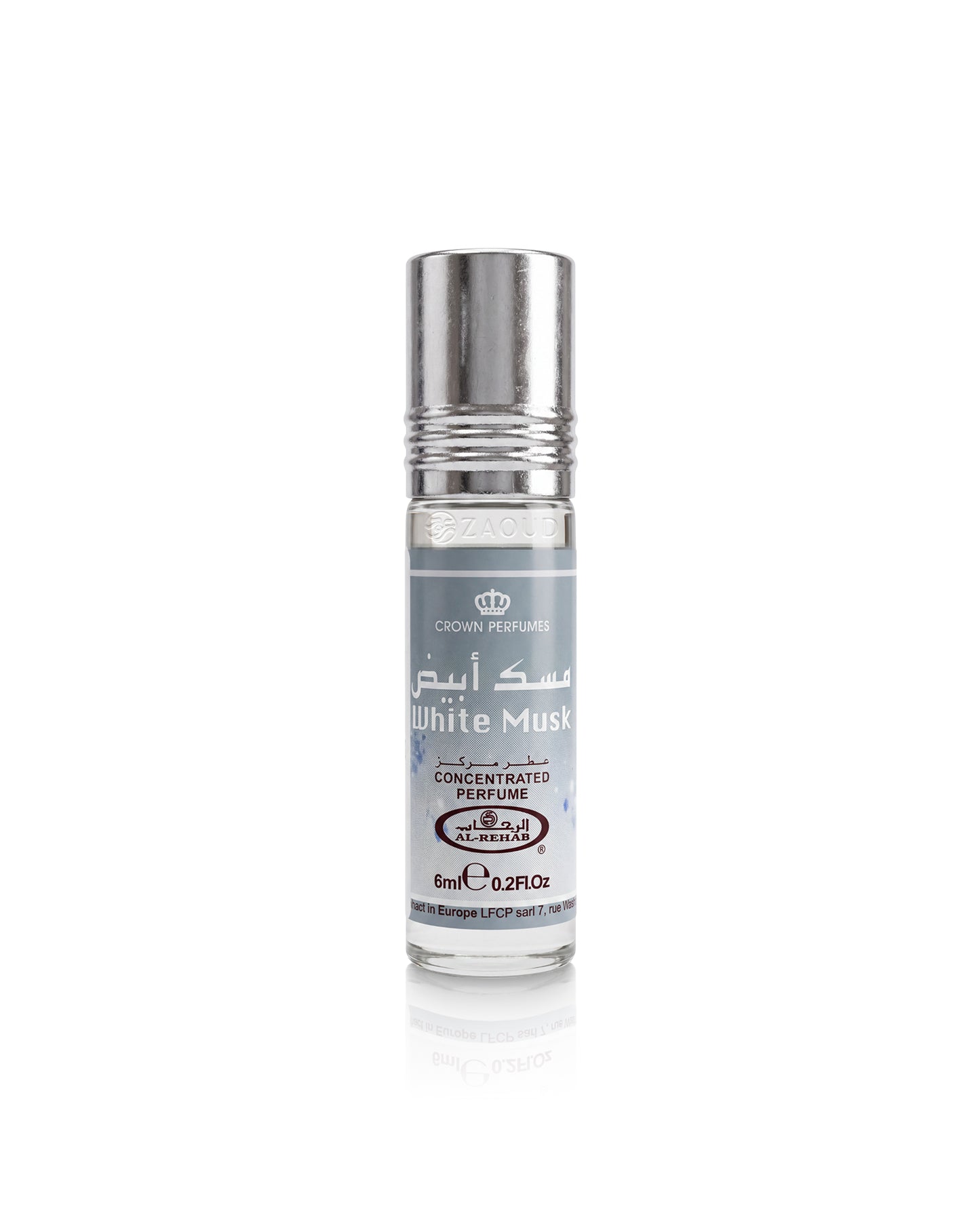 A roll-on perfume bottle labeled 'White Musk' by Crown Perfumes, featuring a silver metallic cap and a white label with gray text, set against a plain white background with a soft reflection below.
