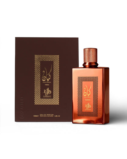 al wataniah kayaan terra perfume bottle shows beside packaging against white background