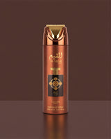 lattafa al qiam gold deodorant bottle with gold and brown design on a matching background